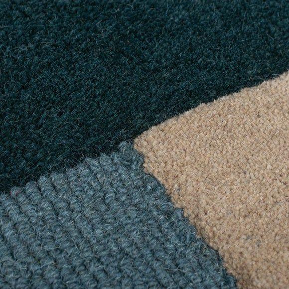 the striking Flair Labyrinth Shaped Wool Rug by casaloom